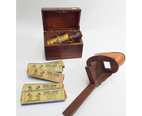 Wooden Perfeoscope stereoscope,  collection of Mickey Mouse toy slides and an old brass ships compass with silvered dial and 