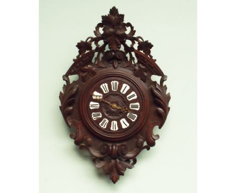 French carved oak framed wall clock with Roman enamel numerals and striking movement 28" high 
