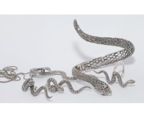 Suite of silver and marcasite set snake design jewellery comprising pierced earrings, pendant necklace and chain, dress ring 