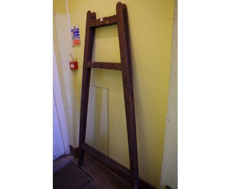 A large antique pine easel,&nbsp;178cm high. 