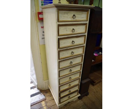 A modern cream and gilt painted ten drawer pillar chest, 40.5cm wide.&nbsp; 