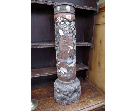 A Japanese carved bamboo, ivory and mother of pearl narrow stick stand,&nbsp;70.5cm high.&nbsp; 