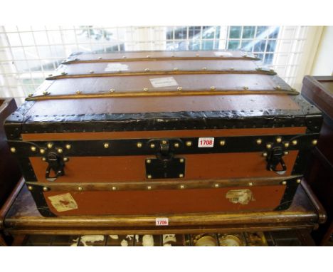 A late 19th /early 20th century Louis Vuitton trunk, the paper label with inscribed number 169937, 30 high x 64.5 wide x 51cm