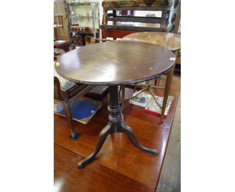 A George III mahogany circular tilt-top tripod table,&nbsp;62cm diameter.&nbsp; 