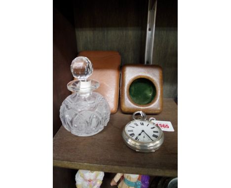 An electroplated Goliath pocket watch, in leather easel case; together with a leather cigar case; and a cut glass globular sc