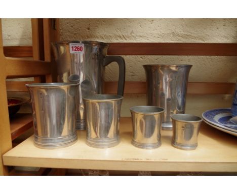 A matched set of six World War l period pewter measures, half gallon to half gill, each with broad arrow stamp.&nbsp; &nbsp;&