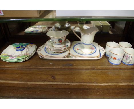 Four Clarice Cliff Rodanthe 'Viscaria' pattern side plates,&nbsp;16cm wide; together with another Art Deco part coffee servic