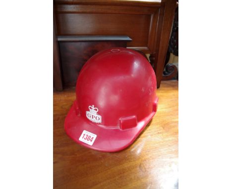 A GPO helmet;&nbsp;together with related kit bag and brass thermometer.&nbsp; 