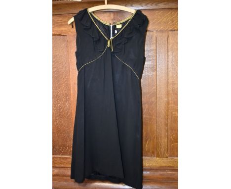 A vintage black crepe dress coat, labelled 'Jay Thorpe, New York';&nbsp;together with a black wool cocktail dress with fur tr