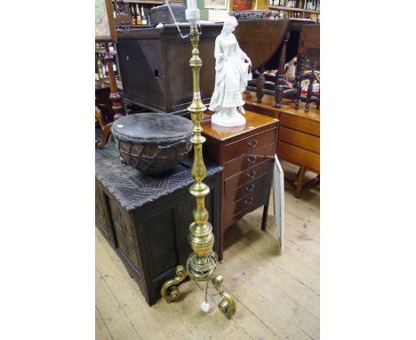 A brass tripod standard lamp,&nbsp;in the Dutch 17th century style. 