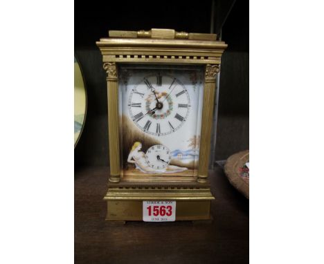 A brass and porcelain carriage clock,&nbsp;decorated with female nudes, with alarm and bell strike, height including handle 2