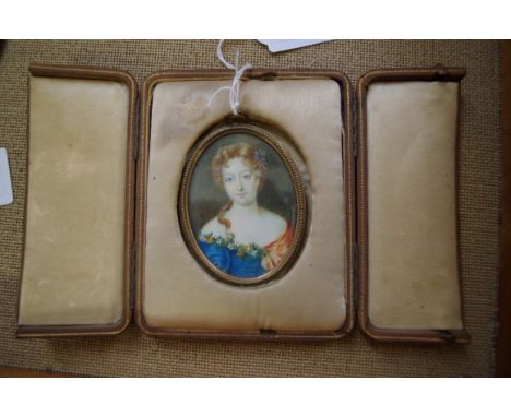 European School,&nbsp;head and shoulders portrait miniature of a lady, indistinctly inscribed verso, 7 x 5.1cm oval, in assoc