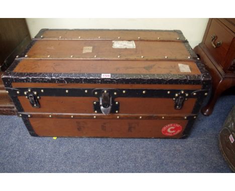 A late 19th/early 20th century Louis Vuitton trunk,&nbsp;labelled 'Trunks for Commercial Travellers...', and numbered 140813,