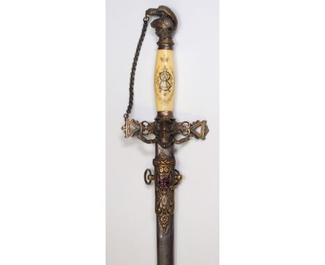 An American Masonic sword by E A Armstrong, Detroit, Michigan, the ivory hilt engraved with the owner's monogram and a Masoni