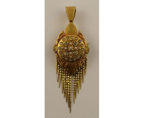 A Victorian diamond and pearl pendant/brooch with locket back set with split pearls, an old cut diamond to the centre and fur