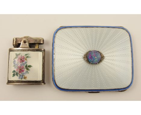 An Adie & Sons ladies cigarette case hallmarked silver 1935, the front in white and blue guilloche enamel with applied opal d