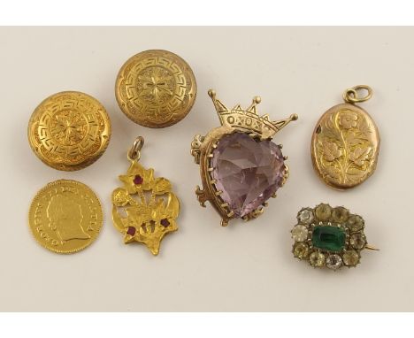 A collection of interesting items to include a bright yellow metal pendant set with rubies, a 9ct luckenbooth brooch set with