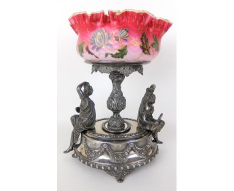 An American silver plate and glass centrepiece by the Meriden Britannia Company, U.S.A., the fringed pink glass bowl with flo