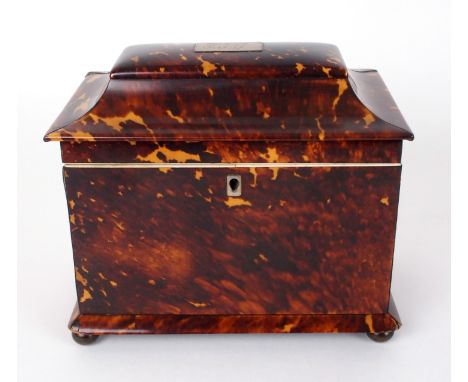 A Regency tortoiseshell tea caddy 19th century, rectangular-form with tapering hinged lid opening to bi-compartment fitted in