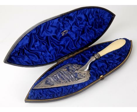 A cased Victorian silver presentation trowel by Hilliard & Thomason, Birmingham 1887, of triangular shape with foliate engrav