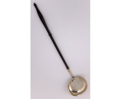 A silver bowled toddy ladle by Jonathan Millidge, Edinburgh 1816, the plain oval bowl with lipped rim and turned wood handle,