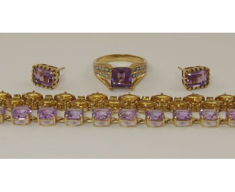 A 9ct amethyst and diamond suite comprising of a bracelet of cushion cut amethysts with a diamond set clasp, length 18.3cm, a