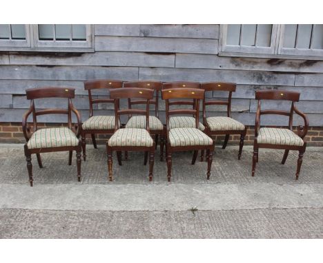A set of eight bar back dining chairs of Regency design with tapestry drop-in seats, on turned supports (6+2) 