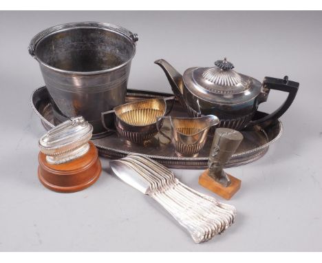 A  Mappin Brothers silver plated three-piece teaset, on tray, a quantity of plated butter knives, an ice bucket and a table l