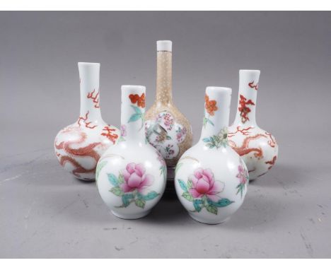 A pair of Chinese sprinkler vases with dragon, flaming pearl and cloud decoration, four-character mark to base, 4" high, a si