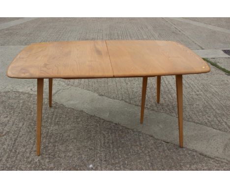 An Ercol 444 light elm extending dining table, on splay supports, 60" x 34" x 28" highCondition:A couple of deeper surface sc