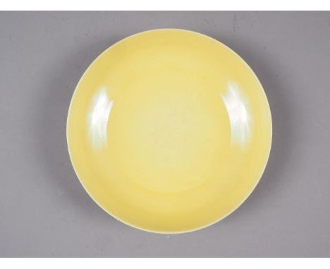 A Chinese yellow glazed dish, six-character mark to base, 6 3/4" diaCondition:Some light surface scratches, no visible major 