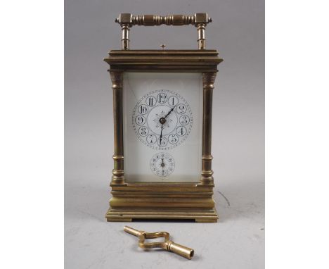 A late 19th century brass cased carriage clock with hour repeat and alarm movement, 6 1/2" highCondition: Crack in dial 10-to