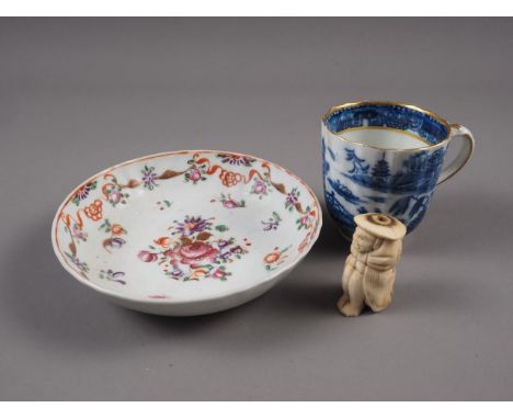 A 19th century Chinese blue, white and gilt decorated teacup (hairline crack), a 19th century Chinese porcelain polychrome de