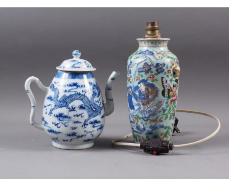 A Chinese blue and white ovoid teapot with associated lid, dragon and cloud decoration, four-character mark to base, 8 1/4" h