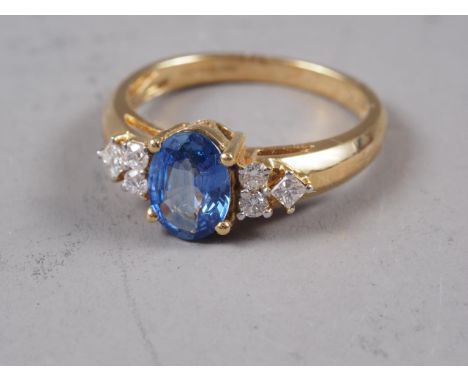 An 18ct gold, sapphire and diamond cluster ring, size O, 4.4g 