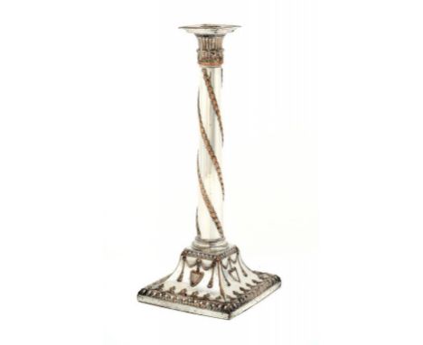 A SHEFFIELD PLATE COLUMNAR CANDLESTICK WITH SPIRALLING BELLFOWERS, C1775 32cm h ++Light wear, the nozzle original