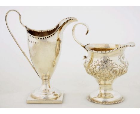 A GEORGE II SILVER OGEE CREAM JUG  later chased, 11cm h, maker's mark rubbed, London 1759 and a George III silver helmet shap