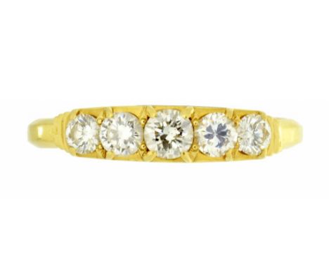 A DIAMOND FIVE STONE RING  with round brilliant cut diamonds, in gold, unmarked, 2.5g, size K 1/2 ++In satisfactory second ha