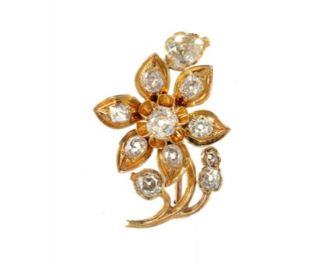 A DIAMOND SPRAY BROOCH  with cushion and pear shaped old cut diamonds, in gold, 2.9cm l, 6g