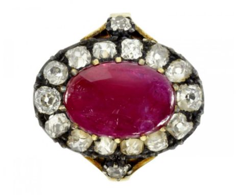 A RUBY AND DIAMOND CLUSTER RING  ruby 0.8 x 1.2cm,   the fluted gold hoop unmarked but for an inventory number, 6.7g, size K½