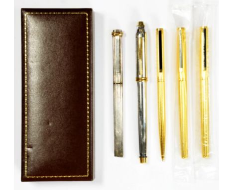 TWO ALFRED DUNHILL GOLD PLATED PENS   unused and sealed in plastic, maker's box, an Alfred  Dunhill gold plated ball point pe