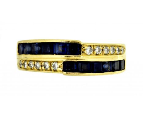 A SAPPHIRE AND DIAMOND RING  with two alternating rows of diamonds and calibré cut sapphires, in gold marked 585, 4.1g,  size