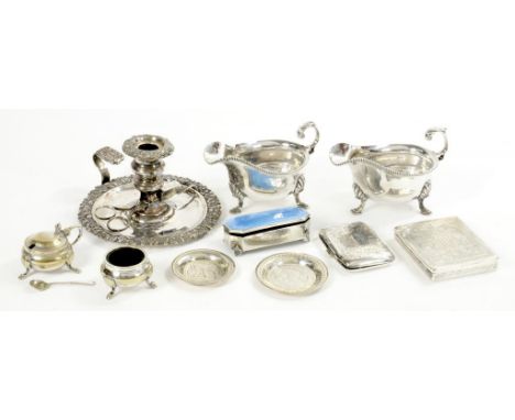 AN EGYPTIAN SILVER CIGARETTE CASE AND TWO DISHES, EARLY 20TH C cigarette case 9cm w, another silver cigarette case, a silver 