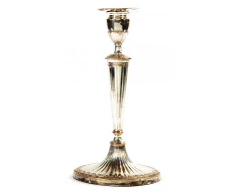 A SHEFFIELD PLATE NEO CLASSICAL CANDLESTICK BY JOHN PARSONS & CO, C1785 on fluted oval foot, nozzle, 30.5cm h Crosskey fig 42