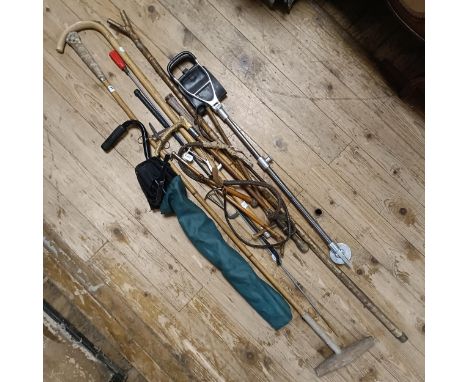 A horse measuring stick, three riding crops and assorted other sporting items (box)