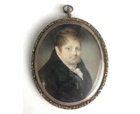 A 19th century portrait miniature, of a gentleman in a jacket, possibly Edward Shadwell Hickman, the reverse inset with hair,