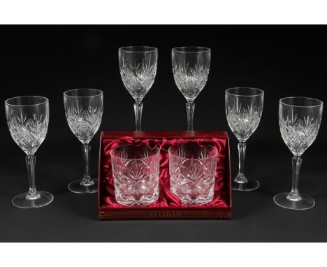 A Webb Continental boxed set of two hand cut crystal whiskey tumblers, Evesham pattern; and six crystal wine glasses (7)