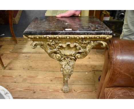 (HP) An unusually small carved giltwood and gesso marble top console table,&nbsp;68.5 high x 45cm wide.&nbsp; 