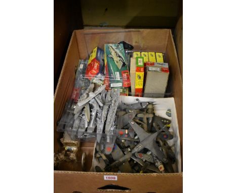 A quantity of plastic aeroplane and ship models,&nbsp;together with empty 'Eagle' kit boxes, small scale plastic figures, and