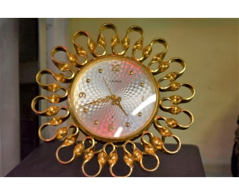 A vintage Luxor brass easel timepiece,&nbsp;with engine turned dial, 17cm diameter, in fitted case.&nbsp; 